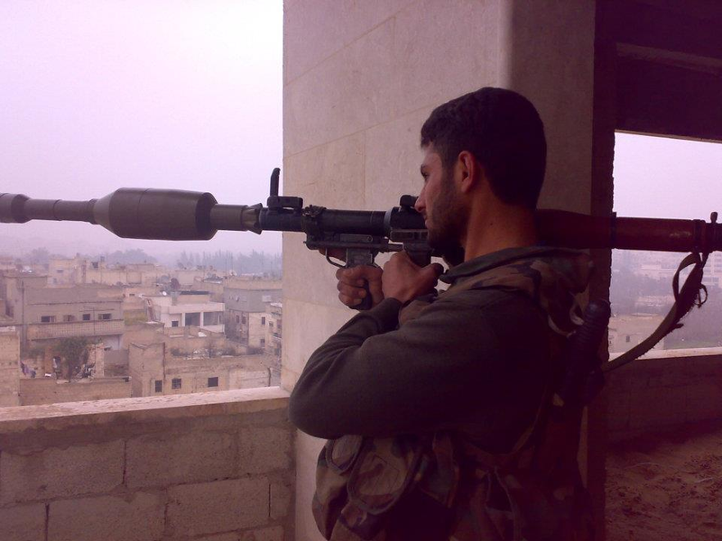 Illustration for article titled Syrian Rebel Posts Sniper's Camera Phone Photos